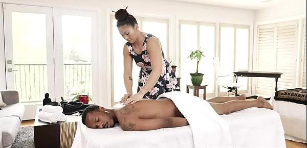  Sultry Asian masseuse Nyomi Star enjoys every second of the sensual fuck massage with black dude Charlie Mac.